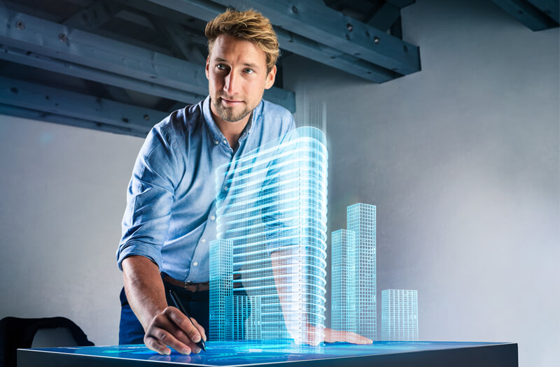 Innovative building conceptualization with 3D planning to drive strategic goals Business professional using tablet