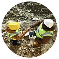 Mining team using tablet computer on site