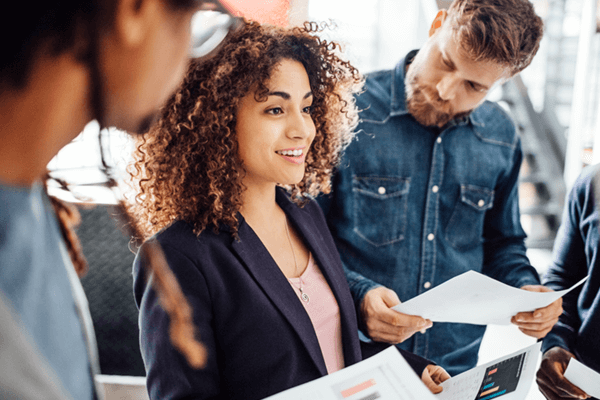 Businesswoman presents agile process plan to team