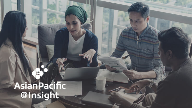 AsianPacific at Insight business team chatting with coworkers