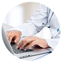 Doctor managing patients and staff on laptop device