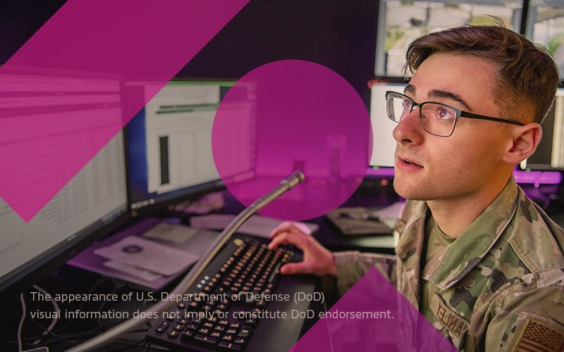 military man reviewing desktop