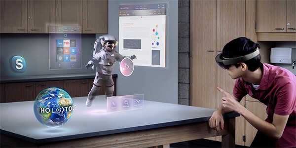 Man using a Microsoft HoloLens hands free