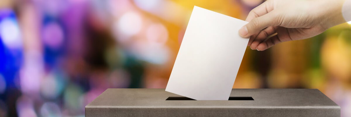 Person casting an election ballot