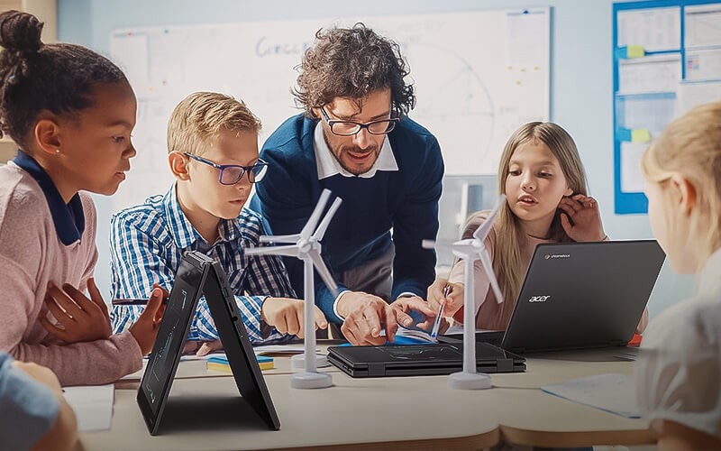 Supporting young learners Group of student learning together with the teacher