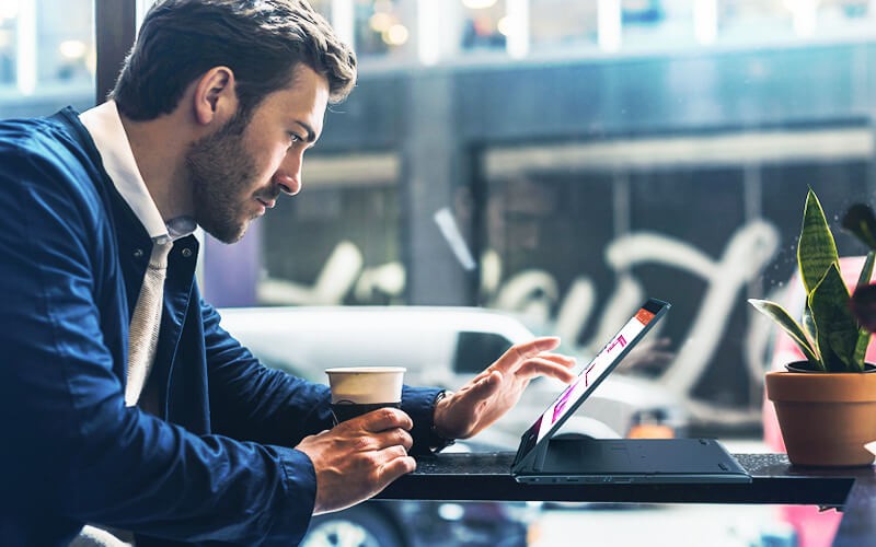 Built for the way you work Man using a TravelMate laptop