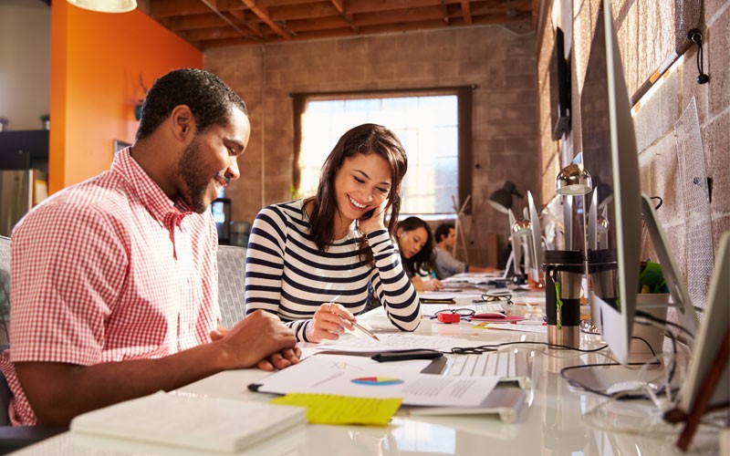 Avaya communication and collaboration solutions Two teammates working together