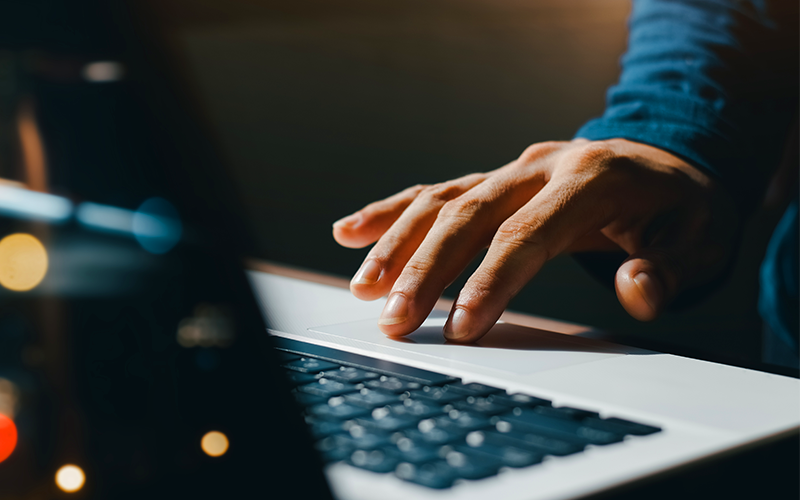 Avigilon® Control Center (ACC) 7 is the most advanced ACC™ video management software. Professional using laptop