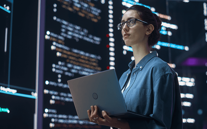 Ubuntu Pro open-source cloud computing solutions Woman using a laptop