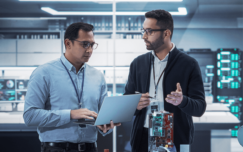 Develop AI effortlessly. IT staffs working together