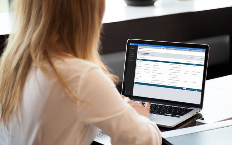 Cb Defense for VMware Woman on laptop with Carbon Black Defense for VMware