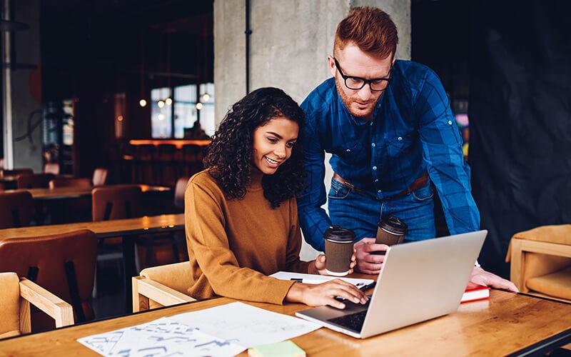 Access the Cisco EA Workspace Businessman and businesswoman working together