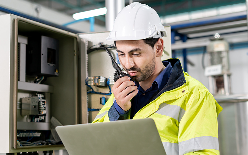 ClearVision provides expert technical engineering and installation service for all A/V product lines Worker using laptop