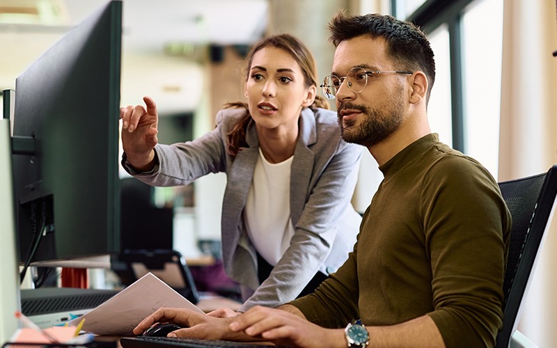 Empower your team with high quality, refurbished desktop computers Professionals working on their station