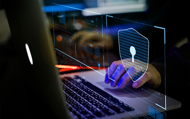 Accurately detect and respond to data risks across your network with Code42 Incydr. Professional working on laptop