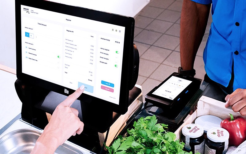 Your customers deserve a superior interactive experience, and your business deserves technology solutions Employee using POS