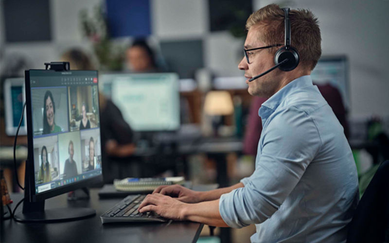 The IMPACT line offers robust and reliable audio solution Man using EPOS Impact headset