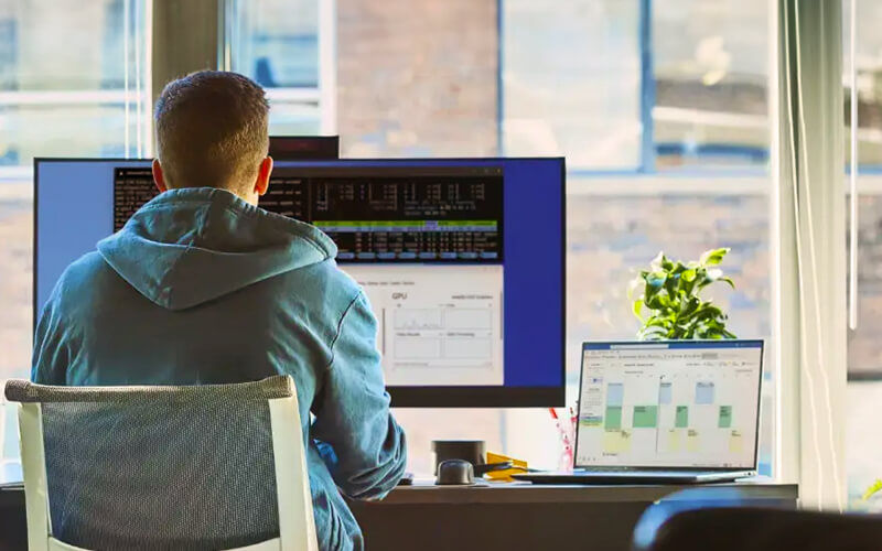 Post-warranty Man working at the office