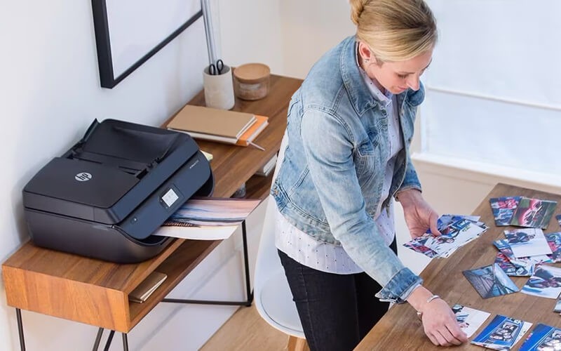 Designed for consistent, high-quality prints Woman printing picture using HP printer