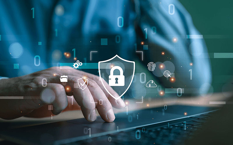 Infoblox Universal DDI™ Product Suite Person typing on laptop