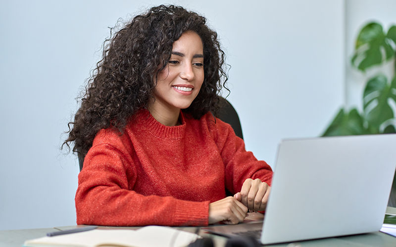 AI Defense Agents Woman using a laptop