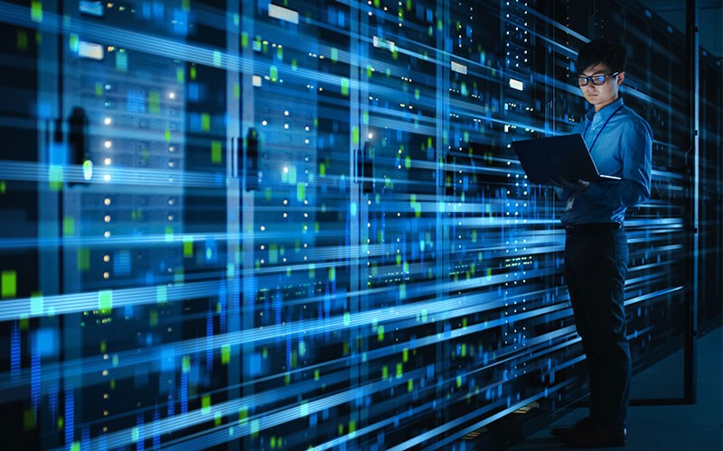 Lenovo warranty services Woman using Lenovo device traveling