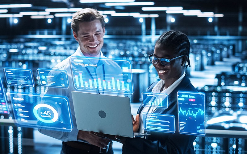 Simplify workflows with unified monitoring. Teammates working together at the office