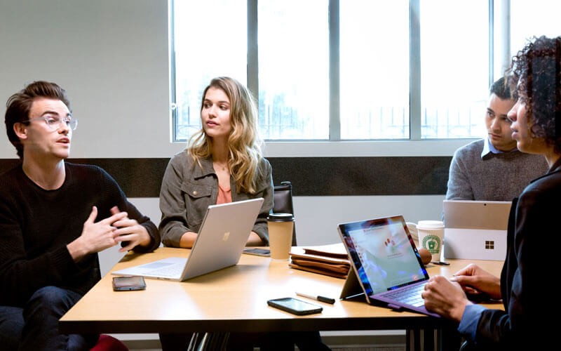 Insight and Microsoft provide software, cloud and device solutions Business meeting round table