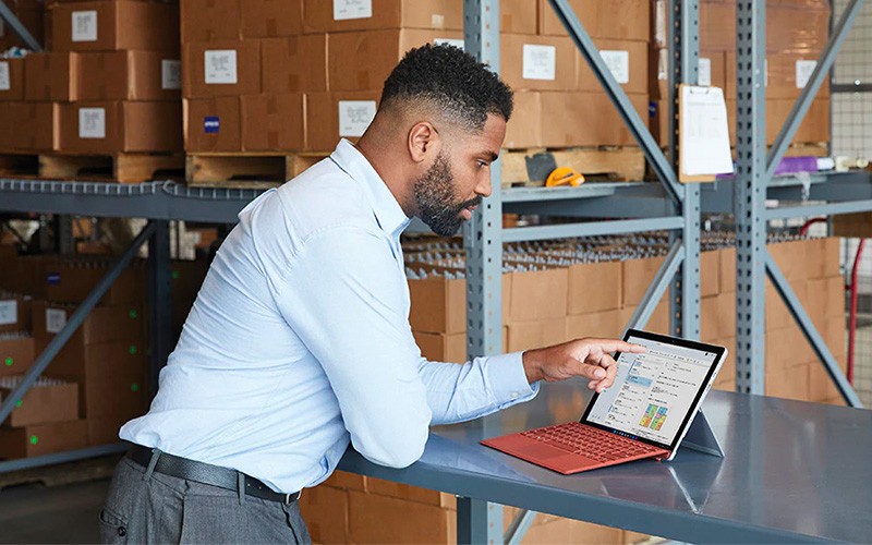 These durable tools should seamlessly integrate with external displays and scanning devices. Professional working on retail store