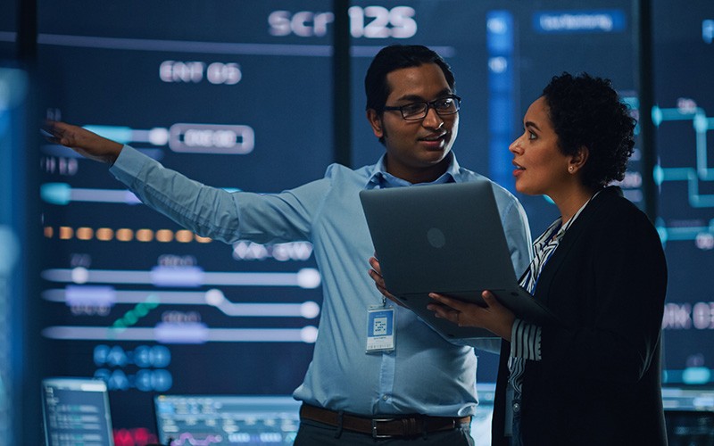 PC Matic Pro helps organizations adopt a Zero Trust approach to application whitelisting. Two workers discussing about their work