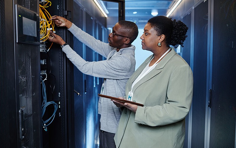 Site audits Two person inside the data center