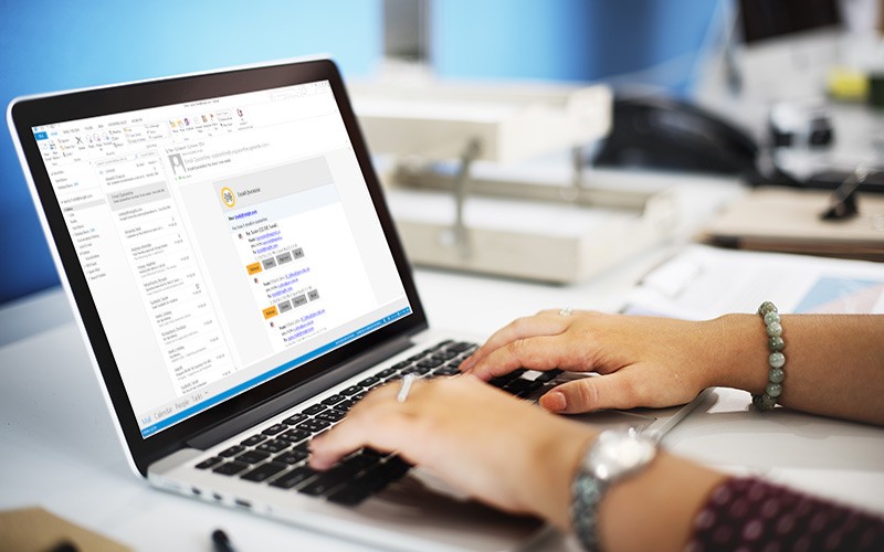 Prevent phishing, ransomware and BEC attacks before they happen with Trend Micro™ Email Security. Professional working on laptop