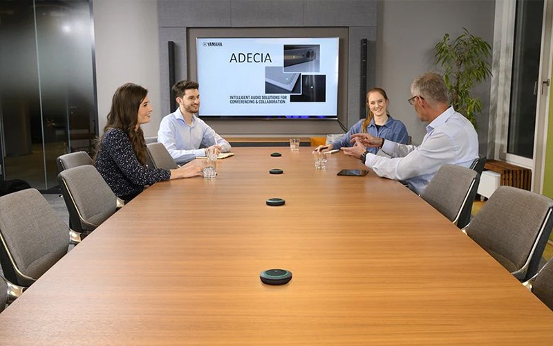 Professionals using ADECIA wireless microphone