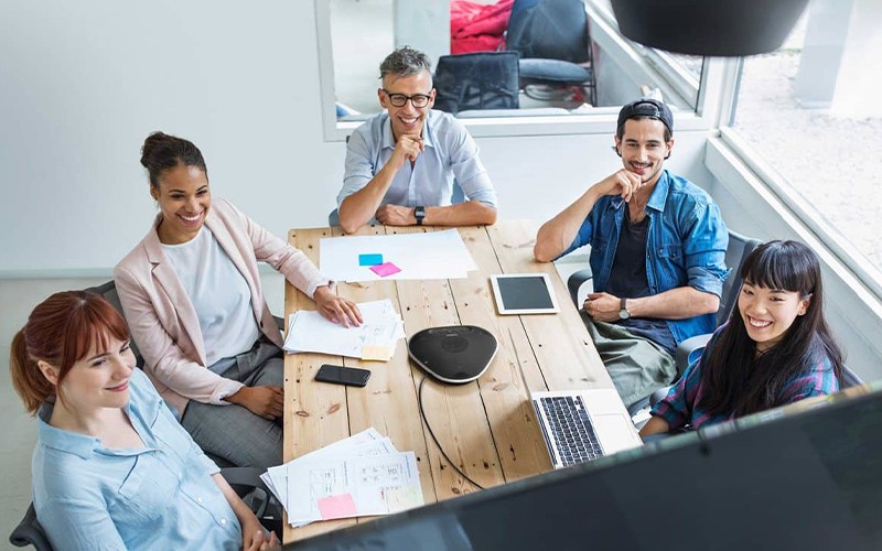 When you plug in in the YVC-330 portable USB and Bluetooth® conference phone at any table Professionals using YVC-330 portable USB and Bluetooth® conference phone